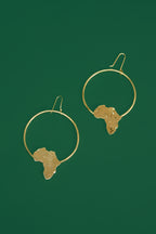Gold hoop earrings with an  Africa map shape accent on the bottom part of the hoop